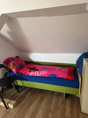 Ein Bett oder Betten in einem Zimmer der Unterkunft Fürsten Zimmer