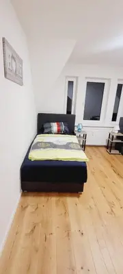 Ein Bett oder Betten in einem Zimmer der Unterkunft Top möblierte Wohnung in Frankenthal