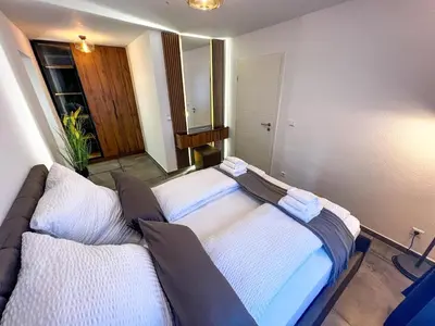 Ein Bett oder Betten in einem Zimmer der Unterkunft Cozy Apartment in Heart of Durlach
