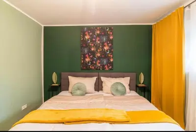 Ein Bett oder Betten in einem Zimmer der Unterkunft Appartio - Apartment für 2 - Küche - WiFi - Altstadtlage