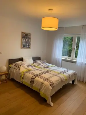 Ein Bett oder Betten in einem Zimmer der Unterkunft Helle gemütliche Wohnung mit 3 Zimmer und Terrasse, 80m2