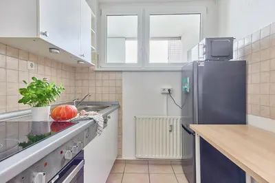 Küche/Küchenzeile in der Unterkunft Rosalia -Zentrumsnahe Wohnung mit Balkon & Parkplatz, ideal für Familien & Geschäftsreisende