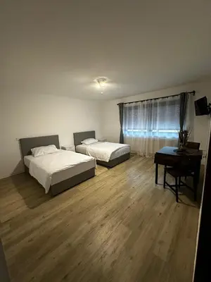 Ein Bett oder Betten in einem Zimmer der Unterkunft VDM Ferienwohung Pfungstadt