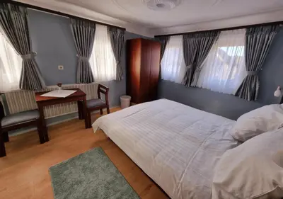 Ein Bett oder Betten in einem Zimmer der Unterkunft QC5 Pension Buchen in Odenwald