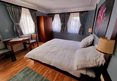 Ein Bett oder Betten in einem Zimmer der Unterkunft QC5 Pension Buchen in Odenwald