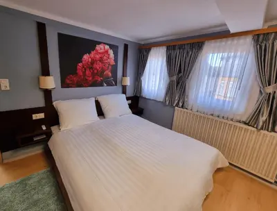 Ein Bett oder Betten in einem Zimmer der Unterkunft QC5 Pension Buchen in Odenwald