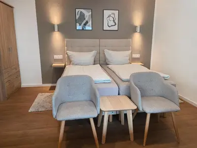 Ein Bett oder Betten in einem Zimmer der Unterkunft Hotel Traube Rheinhessen