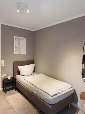 Ein Bett oder Betten in einem Zimmer der Unterkunft Hotel Traube Rheinhessen