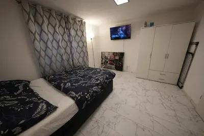 Ein Bett oder Betten in einem Zimmer der Unterkunft Stilvolle 2-Zimmer-Oase