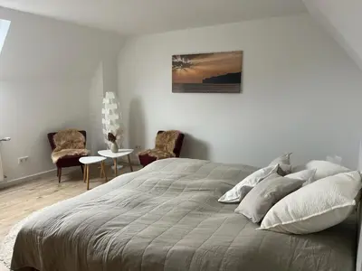 Ein Bett oder Betten in einem Zimmer der Unterkunft Neues Ferienappartment PfalzHerz