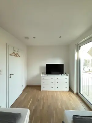 TV/Unterhaltungsangebot in der Unterkunft Neu! Exclusives City-Apartment - Fußbodenheizung, Regendusche, Waschmaschine