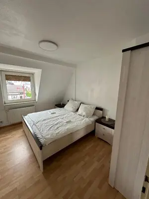 Ein Bett oder Betten in einem Zimmer der Unterkunft Leimen51 Whg2