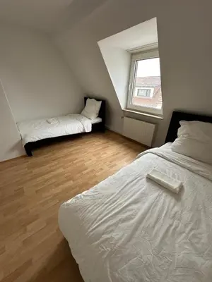 Ein Bett oder Betten in einem Zimmer der Unterkunft Leimen51 Whg2