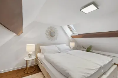Ein Bett oder Betten in einem Zimmer der Unterkunft STARLIVING Premium Home