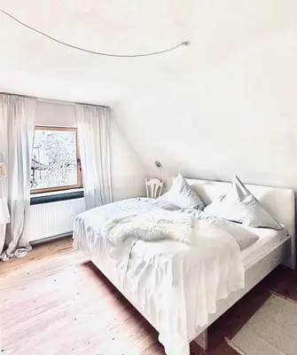 Ein Bett oder Betten in einem Zimmer der Unterkunft Fewo RITA