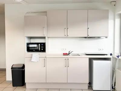 Küche/Küchenzeile in der Unterkunft modern living studios Karlsbad