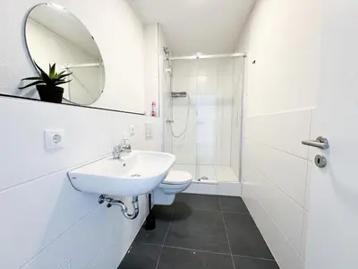 Ein Badezimmer in der Unterkunft modern living studios Karlsbad