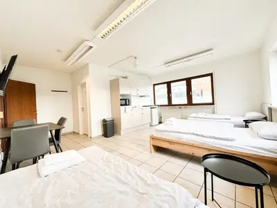Ein Bett oder Betten in einem Zimmer der Unterkunft modern living studios Karlsbad