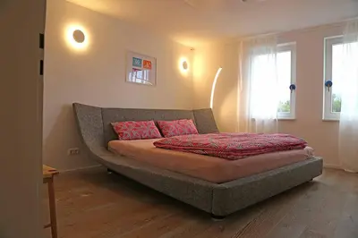 Ein Bett oder Betten in einem Zimmer der Unterkunft Ferienhaus Blaues Häuschen