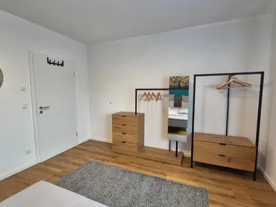 Ein Bett oder Betten in einem Zimmer der Unterkunft Ferienwohnung in Schwieberdingen