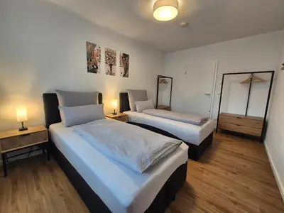 Ein Bett oder Betten in einem Zimmer der Unterkunft Ferienwohnung in Schwieberdingen