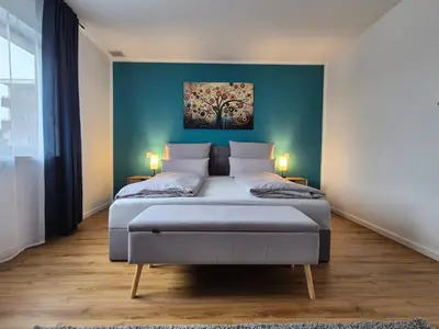 Ein Bett oder Betten in einem Zimmer der Unterkunft Ferienwohnung in Schwieberdingen