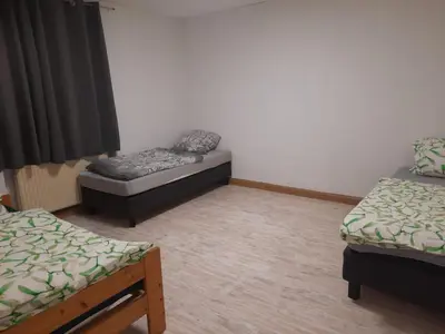 Ein Bett oder Betten in einem Zimmer der Unterkunft gemütliche Wohnung im Herzen von Heilbronn