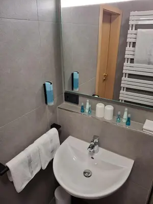 Ein Badezimmer in der Unterkunft Hotel am Hardtsee