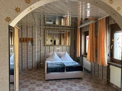 Ein Bett oder Betten in einem Zimmer der Unterkunft Central Hotel