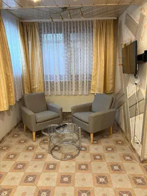 Ein Sitzbereich in der Unterkunft Central Hotel