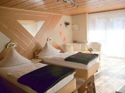 Ein Bett oder Betten in einem Zimmer der Unterkunft Central Hotel