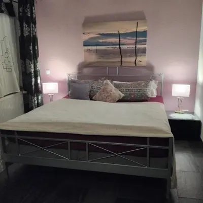 Ein Bett oder Betten in einem Zimmer der Unterkunft Residenz am Berg