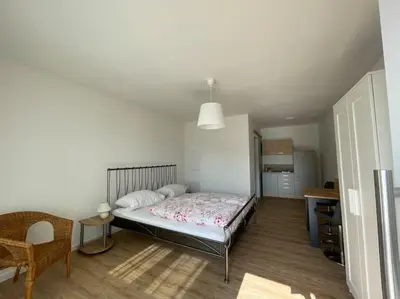 Ein Bett oder Betten in einem Zimmer der Unterkunft Gästezimmer im Weingut Kissel