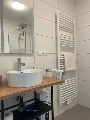 Ein Badezimmer in der Unterkunft Gästezimmer im Weingut Kissel