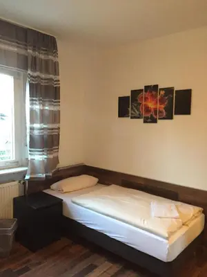 Ein Bett oder Betten in einem Zimmer der Unterkunft Hotel Engel