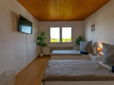 Ein Bett oder Betten in einem Zimmer der Unterkunft bookandstay24 com Rossdorf - Gundernhausen bei Darmstadt, Frankfurt, Rhein Main Gebiet