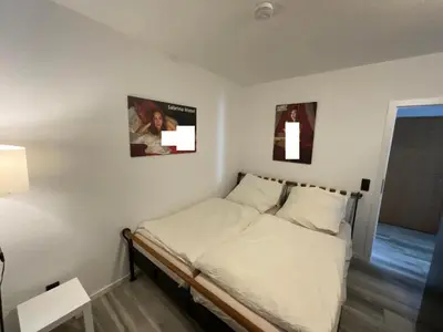 Ein Bett oder Betten in einem Zimmer der Unterkunft Sabrina Penthaus mit einem Schlafzimmer