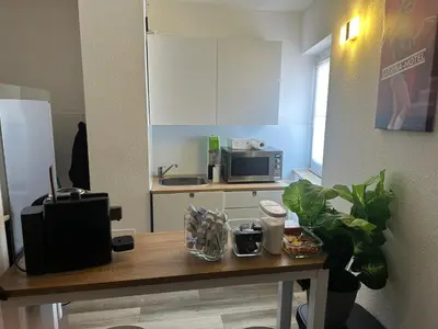 Küche/Küchenzeile in der Unterkunft Sabrina Penthaus mit einem Schlafzimmer