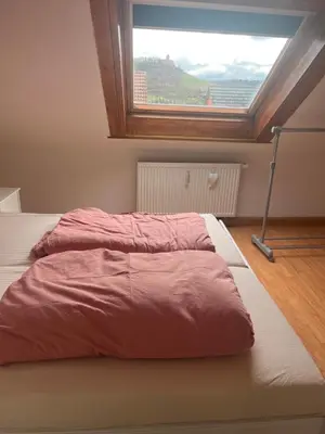 Ein Bett oder Betten in einem Zimmer der Unterkunft 2 Zimmerwohnung