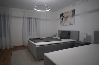 Ein Bett oder Betten in einem Zimmer der Unterkunft Moderne Ferienwohnung mit Kochinsel in Sinsheim Zentral ruhig und Netflix - Erstbezug WeHome Komfort