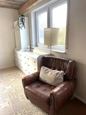 Ein Sitzbereich in der Unterkunft Traumhaftes Tiny Apartment
