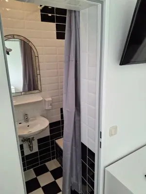 Ein Badezimmer in der Unterkunft Apartmenthaus Edingen
