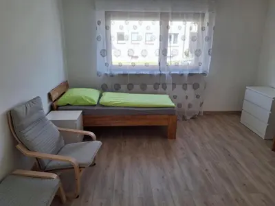 Ein Bett oder Betten in einem Zimmer der Unterkunft Apartmenthaus Edingen
