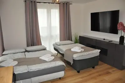 Ein Bett oder Betten in einem Zimmer der Unterkunft 2-Zi Wohn NEU Modern