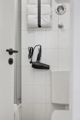 Ein Badezimmer in der Unterkunft Malu Rooms - im Stadtzentrum, Klima, SmartTV, Netflix, 24h Checkin