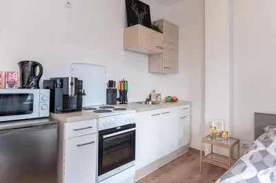 Küche/Küchenzeile in der Unterkunft Helle Wohnung mit Balkon perfekt für Monteure und Arbeiter
