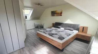 Ein Bett oder Betten in einem Zimmer der Unterkunft Weingut und Gästehaus Fritz
