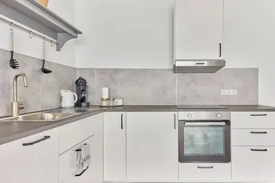 Küche/Küchenzeile in der Unterkunft Zentral und ruhig Netflix Balkon Parkplatz