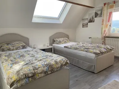 Ein Bett oder Betten in einem Zimmer der Unterkunft gemütliche Ferienwohnung an der Enz
