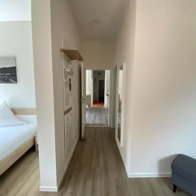 Ein Bett oder Betten in einem Zimmer der Unterkunft Ferienwohnung Leinbaum